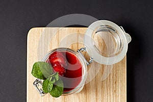 Panna cotta with mint in a glass jar