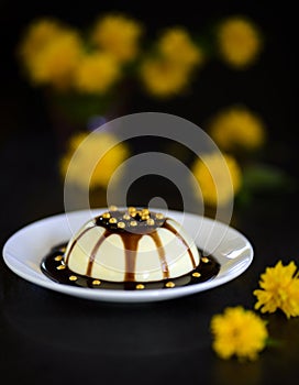 Pannacotta dessert with flowers