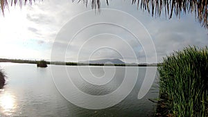 Panning in 4k over one of the lagoons in the swamps of Villa in Chorrillos - Lima, Peru.