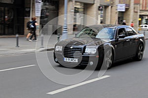 Panning Chrysler 300 on the street