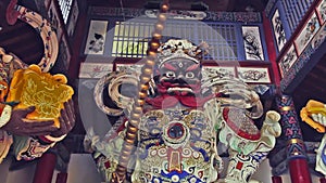 Panning footage of Buddhist deities in Chinese temple