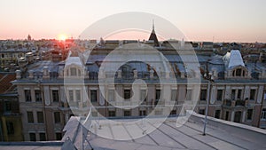 Panning shot of St. Petersburg city against clear sky during sunset