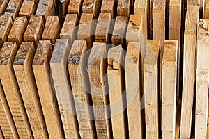 Panno building vertical boards design background rustic beige end of a wooden bar macro