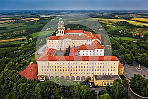 Pannonhalma, Hungary - Aerial view of the beautiful Millenary Benedictine Abbey of Pannonhalma Pannonhalmi Apatsag with blue sky photo