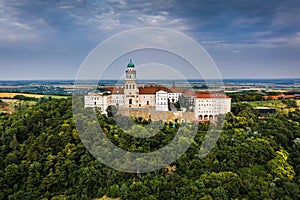 Pannonhalma, Hungary - Aerial view of the beautiful Millenary Benedictine Abbey of Pannonhalma Pannonhalmi Apatsag with blue sky photo