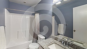 Pano Bathroom interior with lights and purple gray wall paint