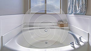 Pano Round built in bathtub with stainless steel faucet inside residential bathroom