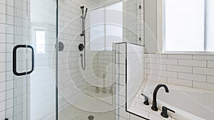 Pano Shower stall with tiles and cohesive plumbing fixtures