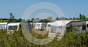 Panorama Abandoned campsite with old caravans