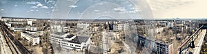 Panorama of abandoned Chernobyl from rooftop on nuclear power pl