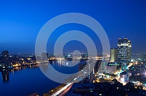 Panorama across Cairo skyline at night