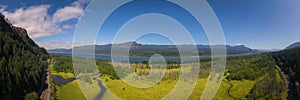 Panorama aerial view from the Oregon side of water leading towards the Columbia River