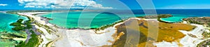 Panorama aerial view of Puerto Rico. Faro Los Morrillos de Cabo Rojo. Playa Sucia beach and Salt lakes in Punta Jaguey.