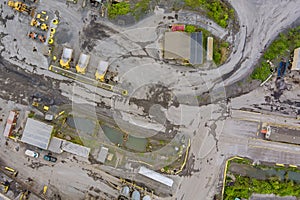 Panorama aerial view quarrying extractive industry big mining of machinery trucks open pit mine mining, dumpers