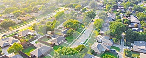 Panorama aerial view urban sprawl subdivision near Dallas, Texas, USA row of single family homes large fenced backyard