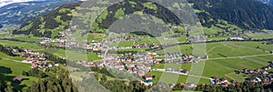 360 Panorama Aerial view of Zillertal Valley village in sunny summer afternoon in Tyrol Austria