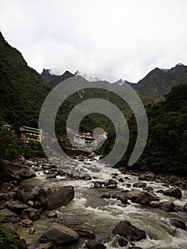 Panorama of Aguas Calientes tourist base andes mountains village town Urubamba river near Machu Picchu Cusco Peru