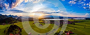 Panorama from the air sunset Forggensee and Schwangau, Germany,