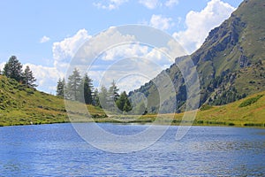 Panorama of alpine lake in mountain in Italy