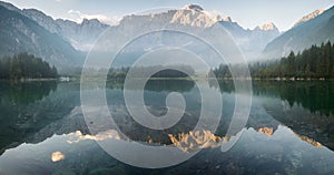 Panorama of Alpine lake,Sunrise over the alpine lake Laghi di Fusine