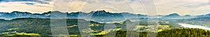 Panorama of Alpine mountains near Lake Worthersee and Velden city