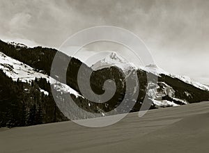 panorama of alpine peaks in fresh snow