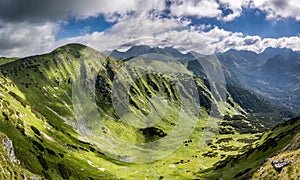 Panorama of amazing mountains valley and neighbouring peaks