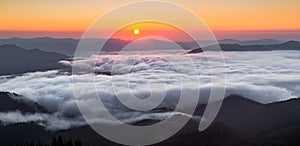 Panorama with amazing sunrise. Landscape with high mountains. Morning fog and dew. Touristic resort Carpathian national park,