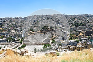 Panorama of Amman with buildings and Roman amphitheater