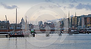 Panorama of Amsterdam. Port city at the sunset.