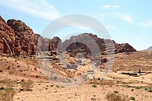 Panorama of ancient city of Petra with street of facades, amphitheatre and caves, Jordan