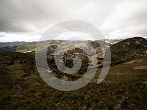 Panorama of andean mountain landscape at volcano caldera crater lake Quilotoa in Cotopaxi Ecuador andes South America