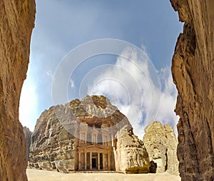 Panorama of Approach and view of the facade of the Treasury building in the ancient Nabatean ruins of Petra