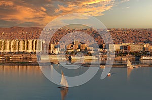 Panorama of Aswan city along Nile river with felucca boats in Egypt, Africa