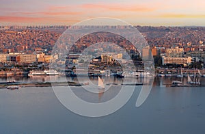 Panorama of Aswan city along Nile river with felucca boats in Egypt, Africa