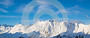 Panorama of the Austrian ski resort Ischgl with skiers.