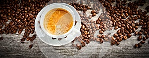 Panorama banner of hot espresso coffee with beans