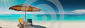 Panorama banner of two chairs and a sun umbrella on an exotic beach on a sunny day with clear blue water and sunny sky