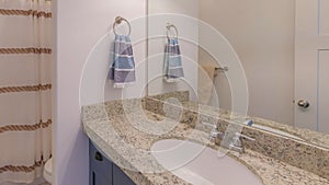 Panorama Bathroom interior with vanity sink and lighting fixtures