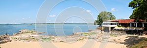 The panorama of beach at lake and restaurant