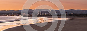 Panorama beach view in Monte Gordo from Vila Real de Santo Antonio in algarve, Portugal photo