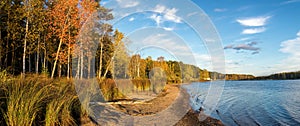 Panorama of beautiful autumn landscape with lake and forest on the Bank of Russia, the Urals