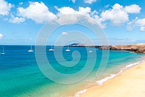 Panorama of beautiful beach and tropical sea of Lanzarote. Canaries