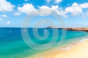 Panorama of beautiful beach and tropical sea of Lanzarote. Canaries