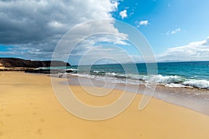 Panorama of beautiful beach and tropical sea of Lanzarote. Canaries