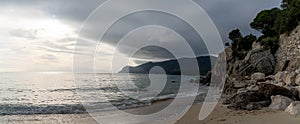 Panorama of Praia da Figueirinho Beach on the Costa Azul in southern Portugal photo