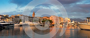 Panorama of beautiful Saint Florent town and harbour, Corsica photo