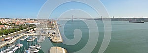 Panorama of Belem marina the river Tejo and the Ponte 25 de Abril