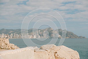 Panorama of Benidorm resort in Spain. Coast of Mediterranean sea, Levante beach, Benidorm skyscrapers, hotels and