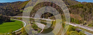 Panorama of bicycle path, river Savinja, road and train line at Tremerje between Celje and Lasko